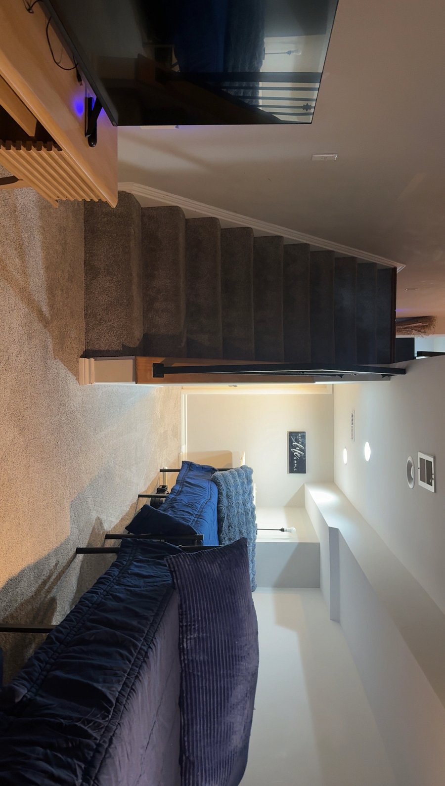 Finished Basement with two twin-xl mattresses + Smart-TV.