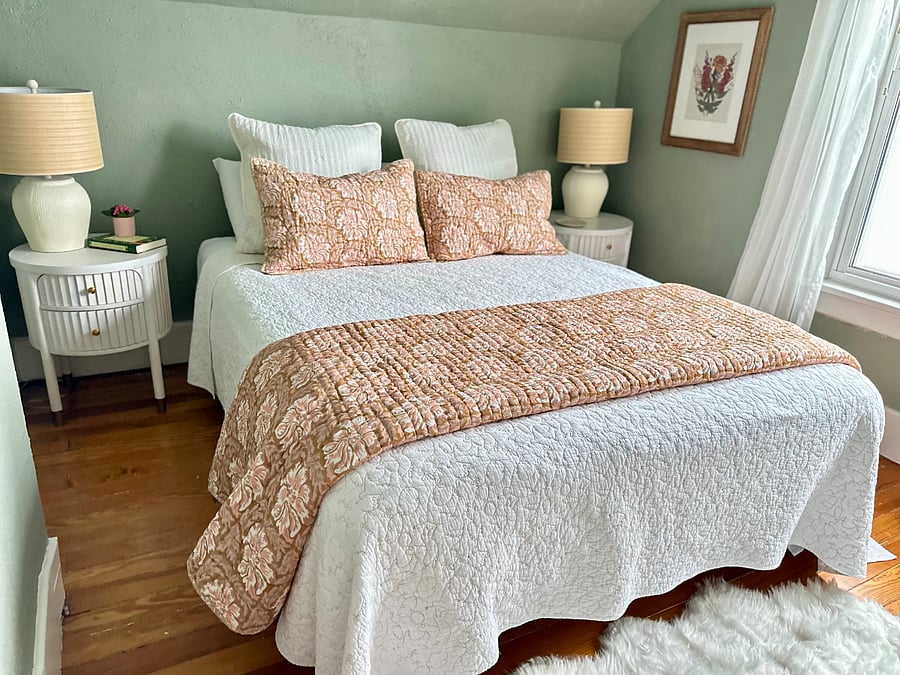 3rd bedroom with double closets and a mini crib.
