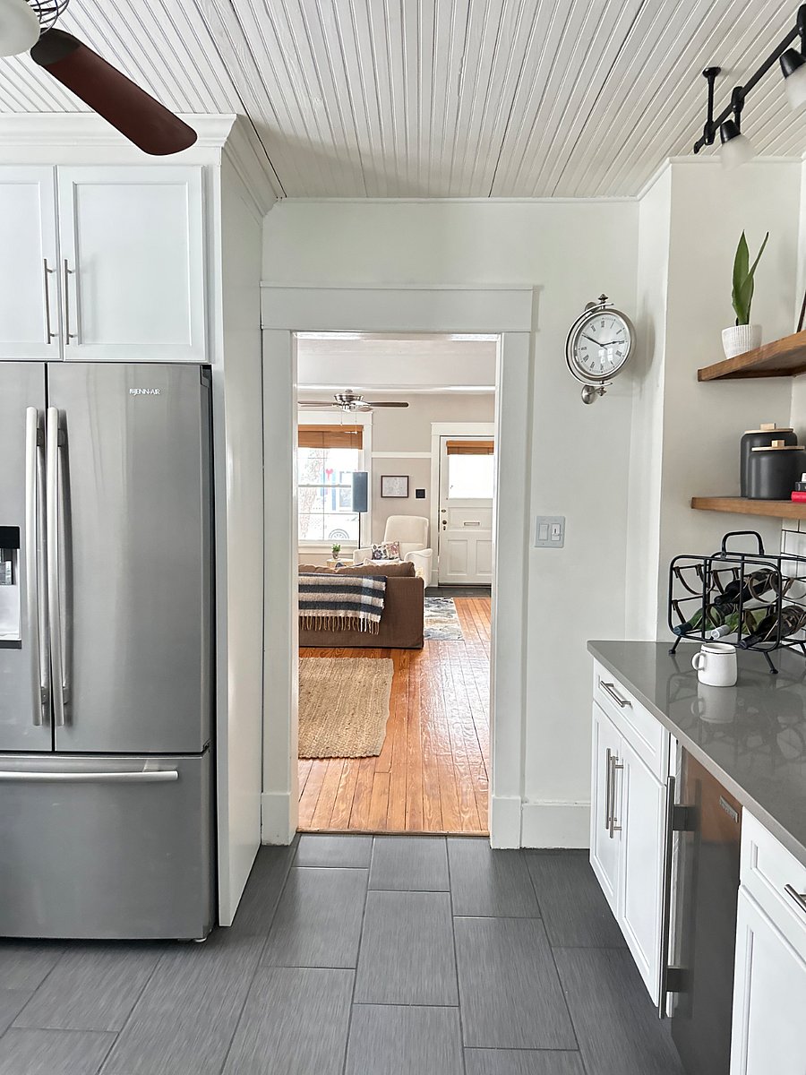 View into living spaces from kitchen.