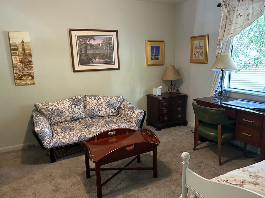 Second bedroom with single bed, single futon, and extra mattress for guests