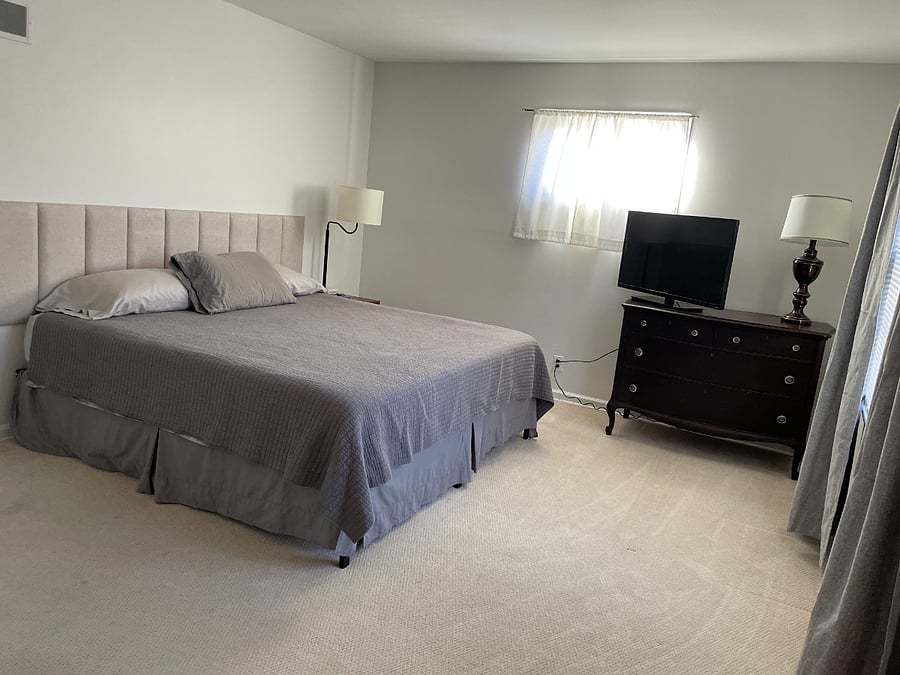 King bed in large bedroom