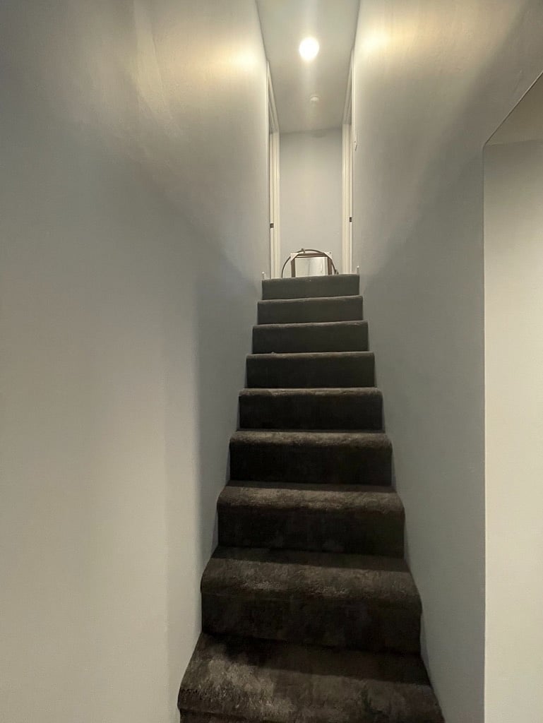 Stairway - house built in 1935. These are steep.