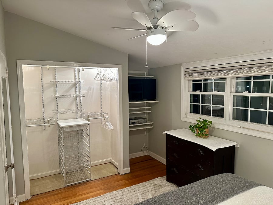 Master bedroom closet with hangers, dresser, Toshiba Fire TV, shelf can be added under TV for laptop work station.