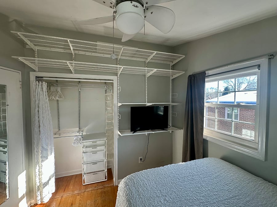 Guest bedroom. Closet and Samsung TV.