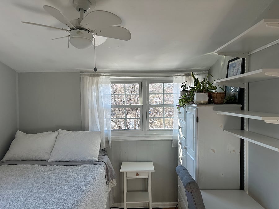 Guest bedroom. Lamp has been added to nightstand.