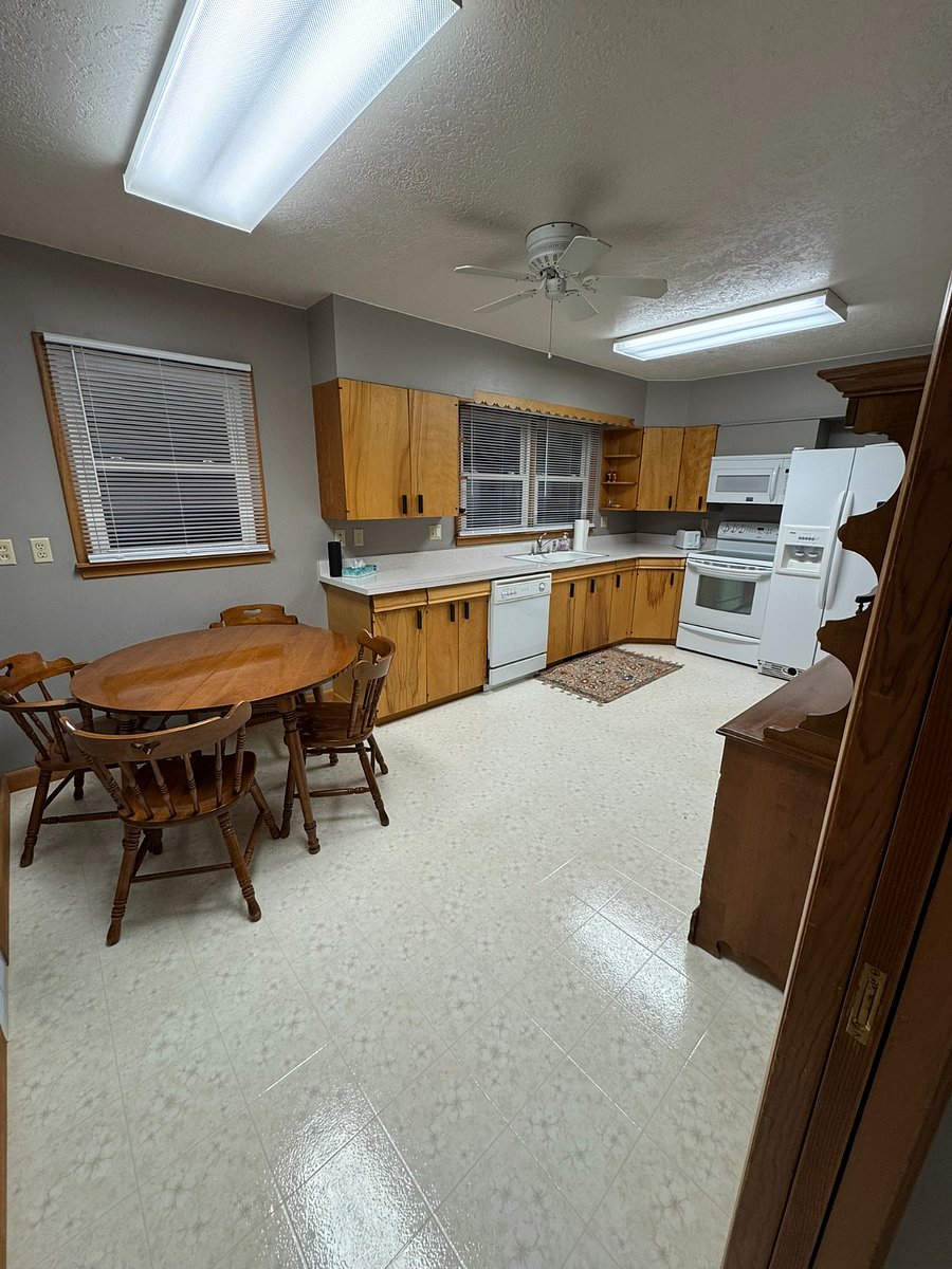 Kitchen - dishwasher, garbage disposal, microwave, stove and full size side by side fridge