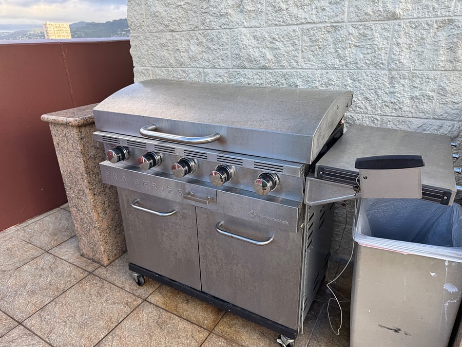 One of 4 BBQs on the rooftop deck area
