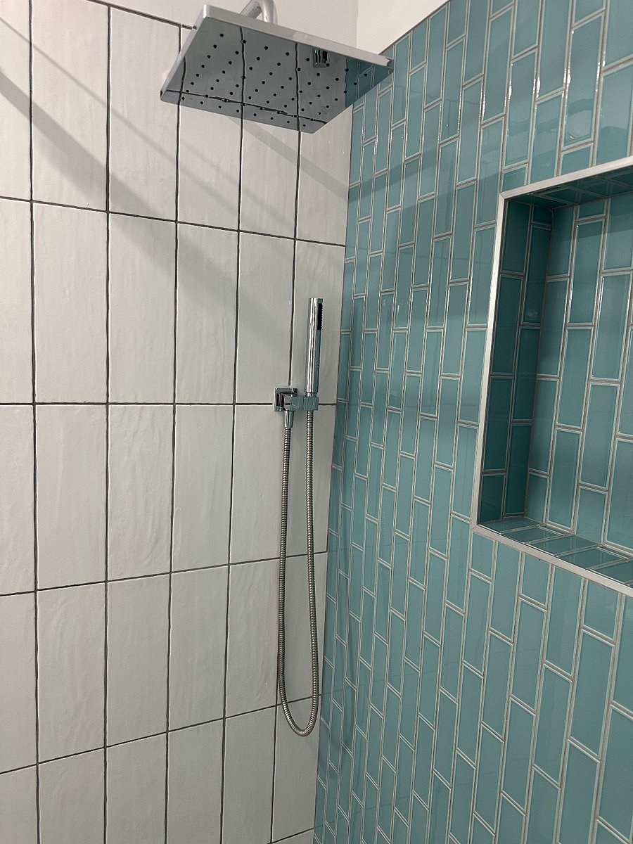 Rain shower head with hand held shower wand.