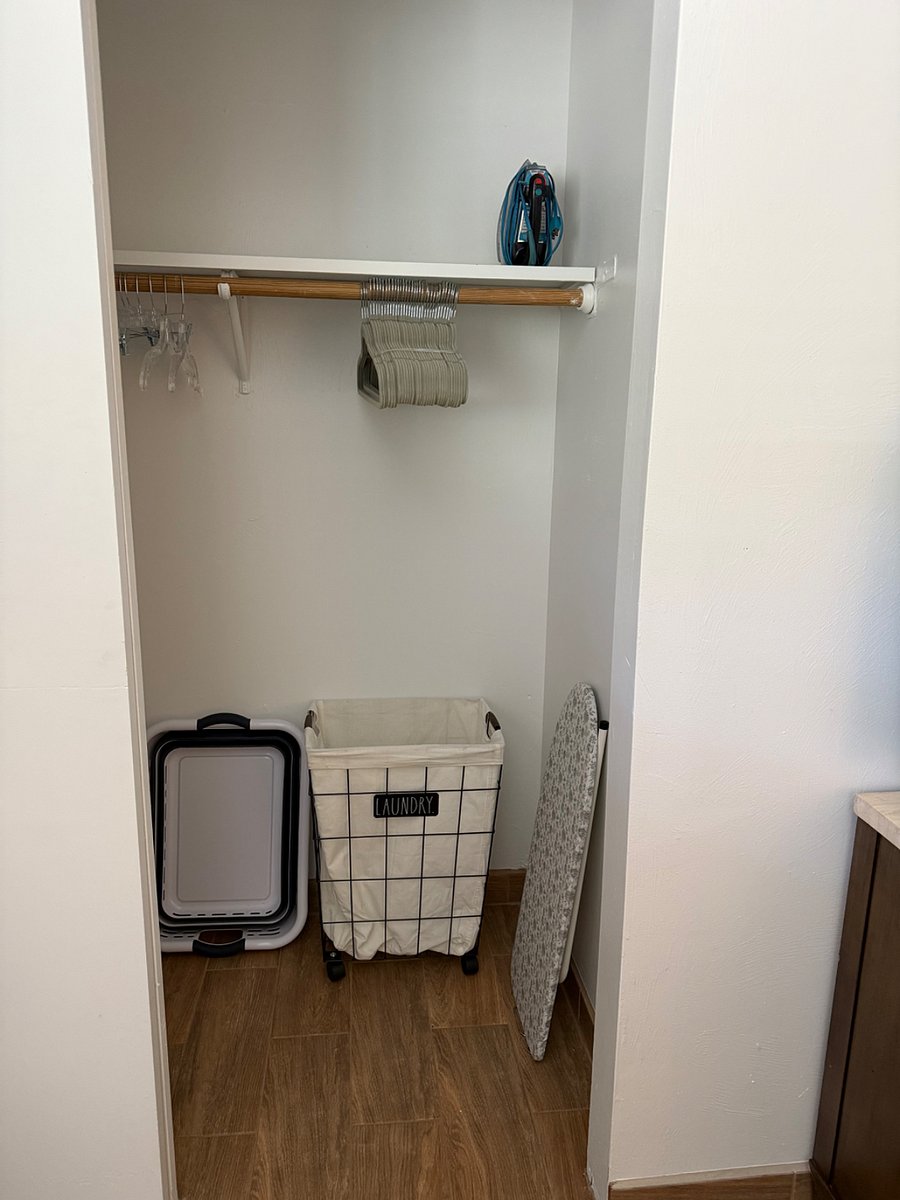 Mini ironing board and laundry baskets.