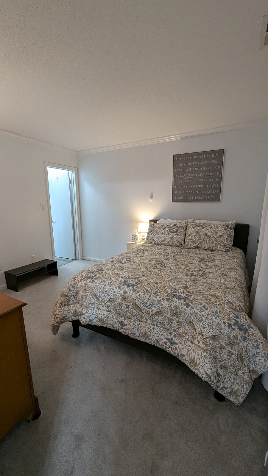 Primary Bedroom - Looking toward en suite full bathroom with laundry