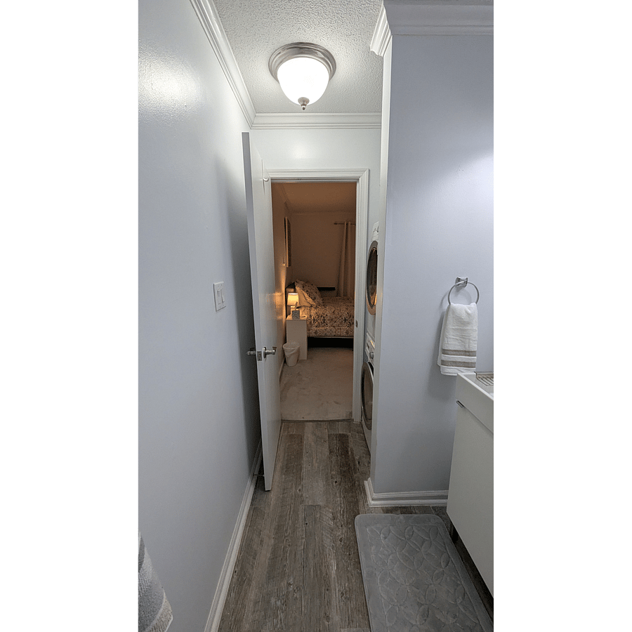 Primary bath - looking back into primary bedroom