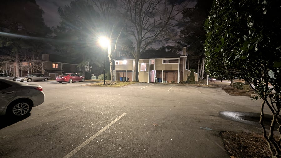 Well lit parking - looking toward the unit (The unit is at the top left in the picture).  Picture taken at night.