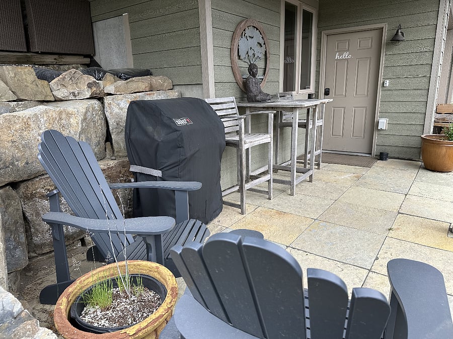 Your patio with bistro table, a Weber Propane BBQ Grill and parking just out front