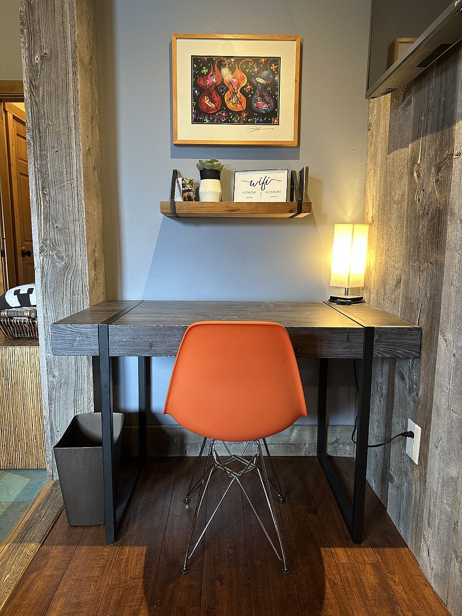 Desk space with fast wifi, this table can be pulled out to make a dining table for two :)