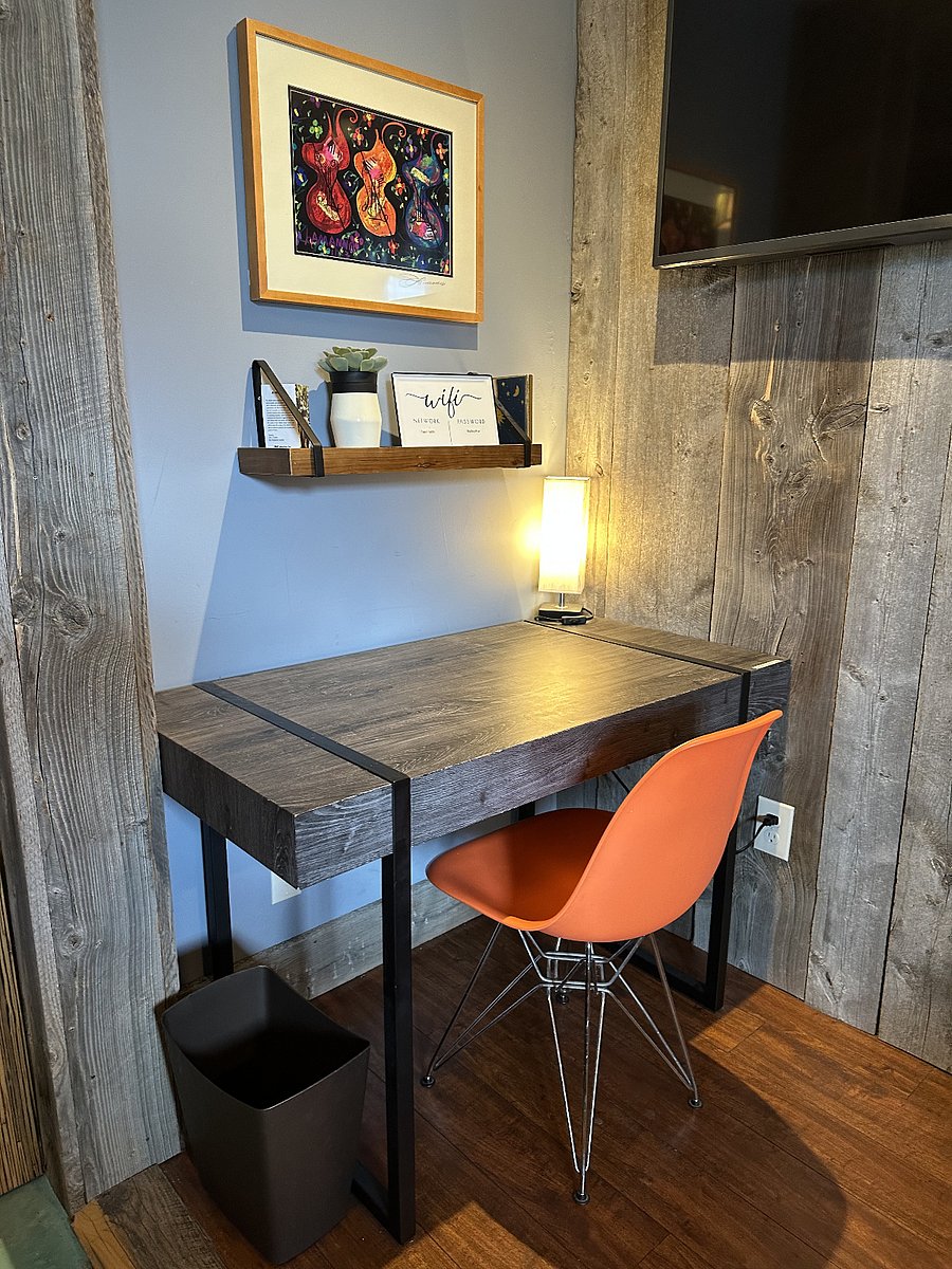 Desk space with fast wifi, this table can be pulled out to make a dining table for two
