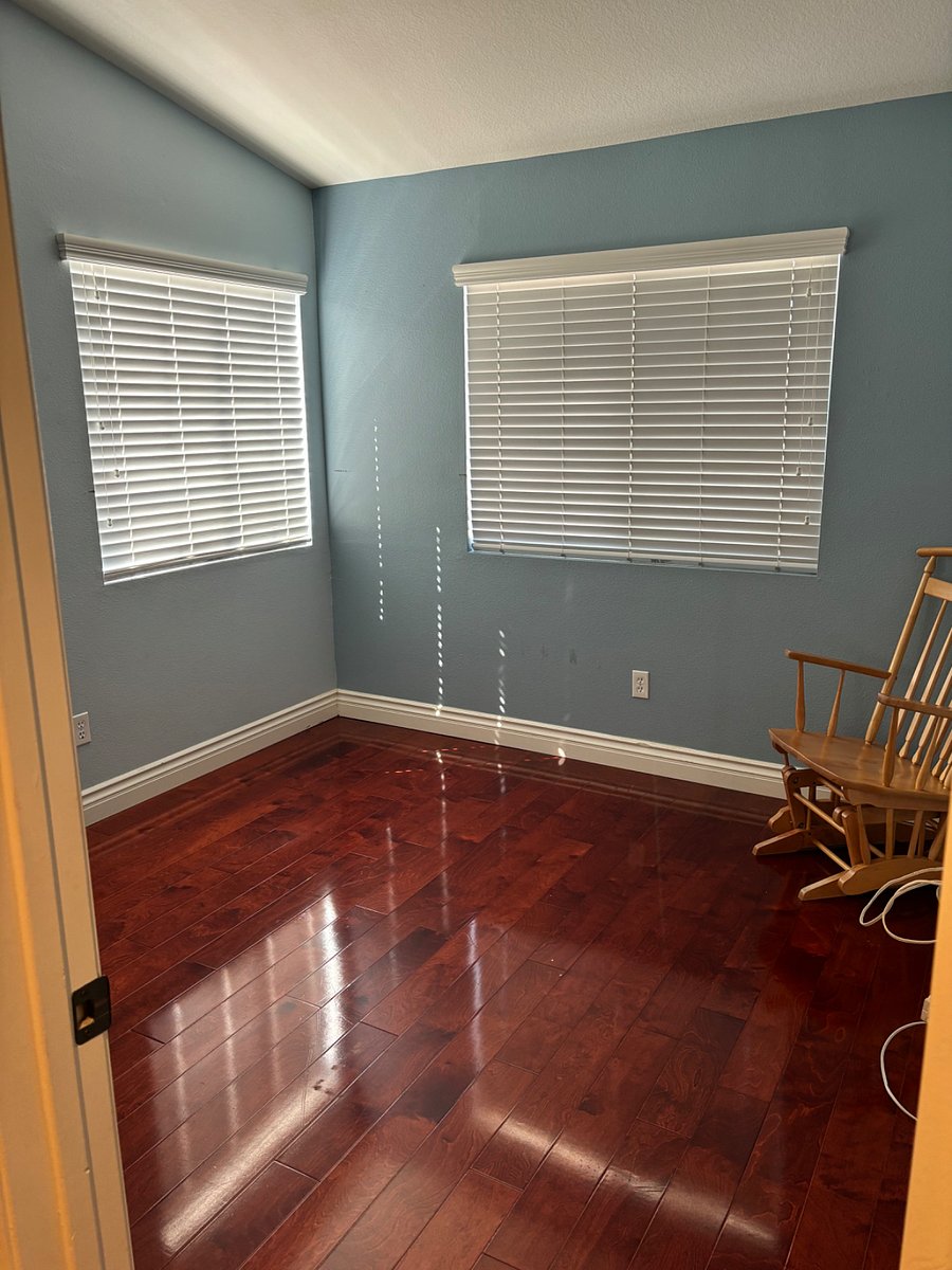 Extra room is currently empty but can have a desk added for office or couch and table added for sitting room. 