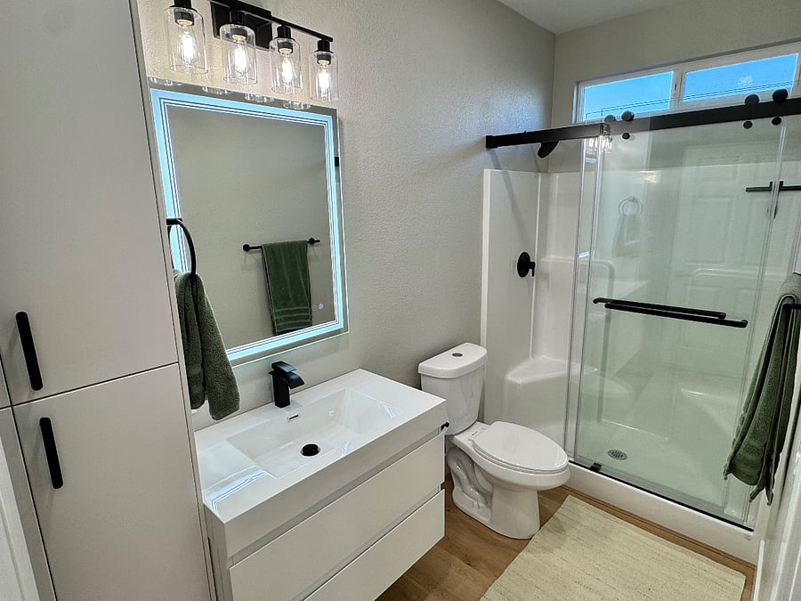 Full bathroom accessible from living area of the unit.