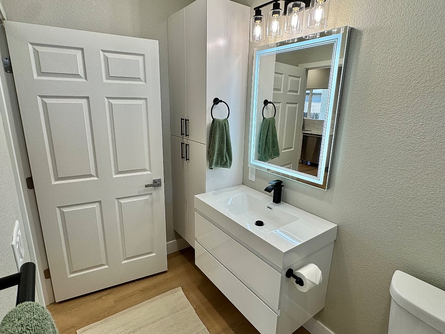 Full bathroom with additional storage