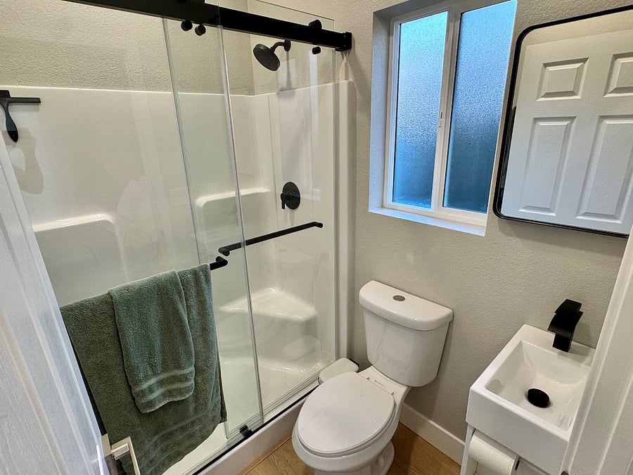 Full bathroom attached to primary bedroom