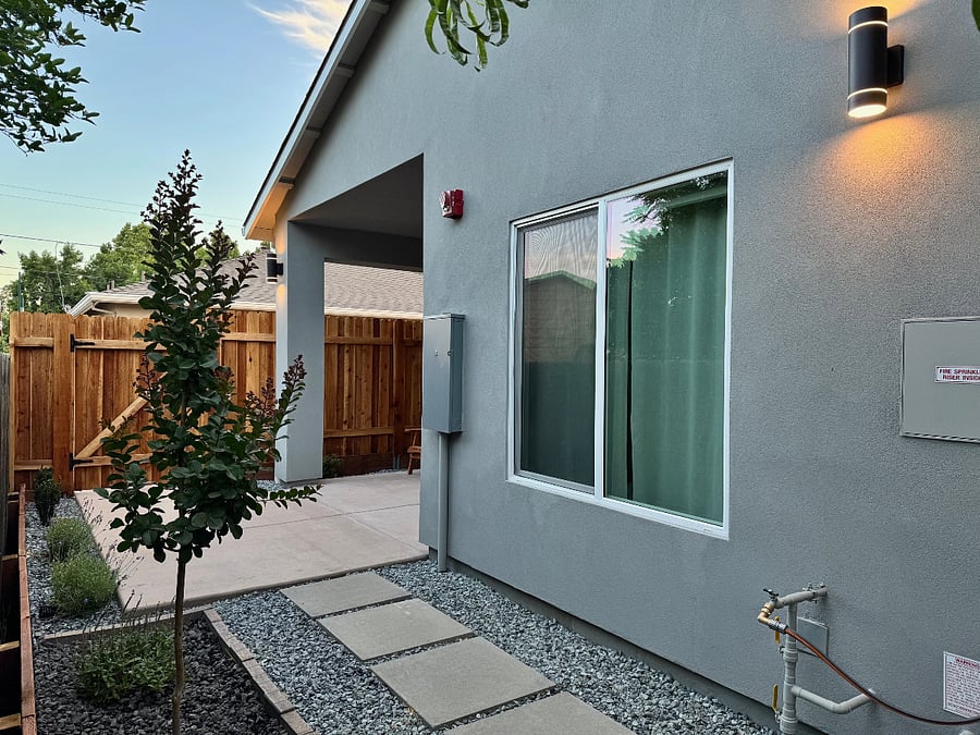 Private patio and mini yard with ambient lighting