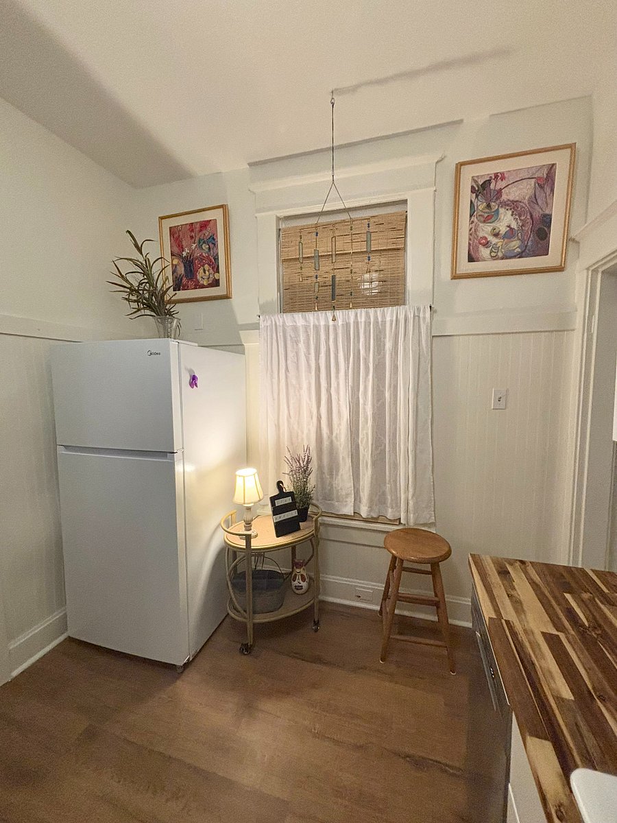Butcher block counter tops and cozy corner.
