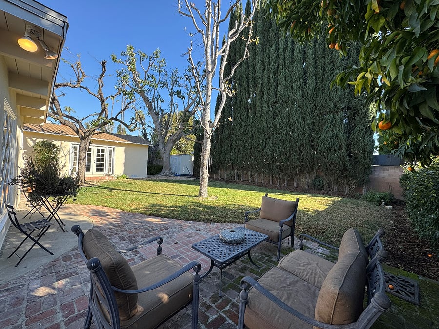 Rear Yard with view of Master Bedroom & Garden Shed