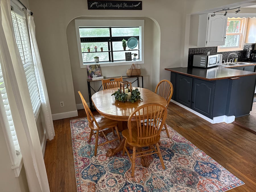 Dining Room Amenities: 6 chairs (extendable table w/leafs), game shelf, plant window.