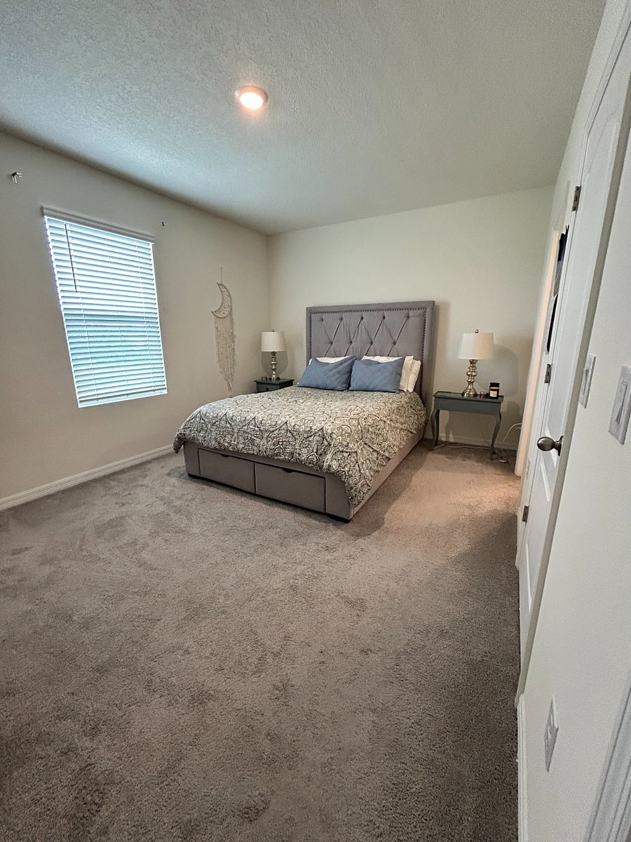 Large Primary bedroom w/large walk-in closet & TV