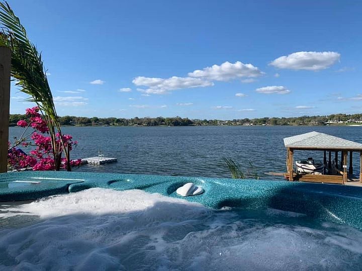 Large 4 person hot tub with lake view!