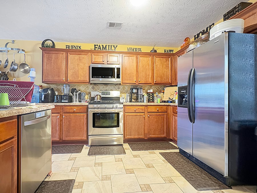 Kitchen has Stainless Steel appliances, Air Fryer, Toaster, Toaster Oven, all the pots and pans you need.  There is also a pantry.