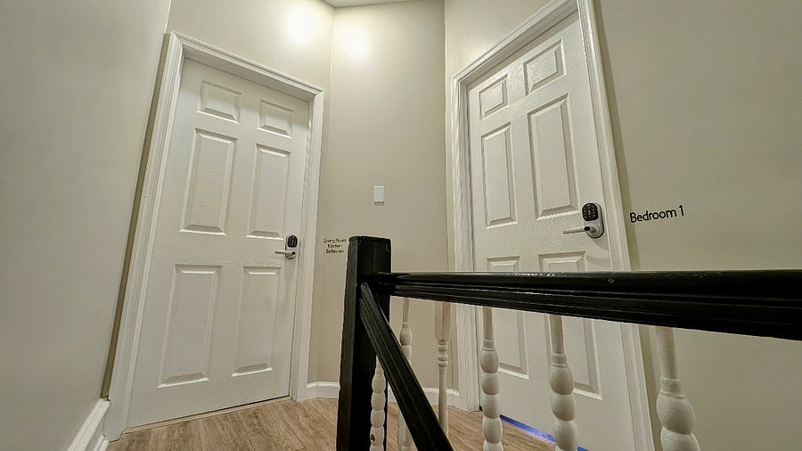 Common 2nd Floor Hallway - Apartment 2 doors (Door 1 - Kitchen, Bathroom, Living room. Door 2 - Bedroom 1)