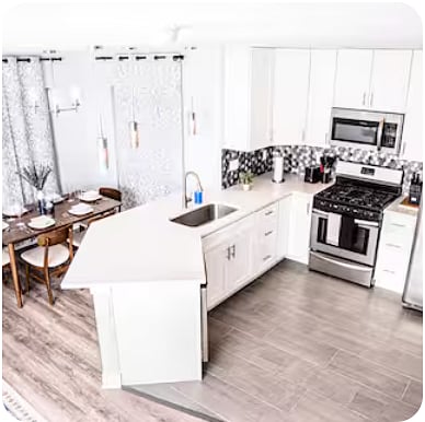 Spacious open-floor kitchen with dining, and entertainment areas perfect for family meals or relaxing after a busy day. Entire house is professionally cleaned.