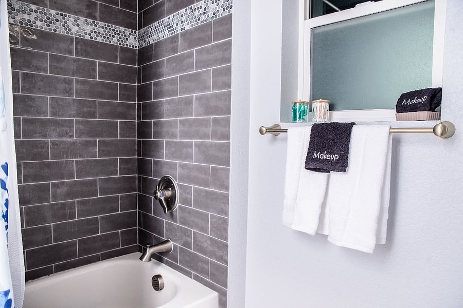 Located upstairs, your full bathroom with beautifully tiled shower and bathtub to unwind. 