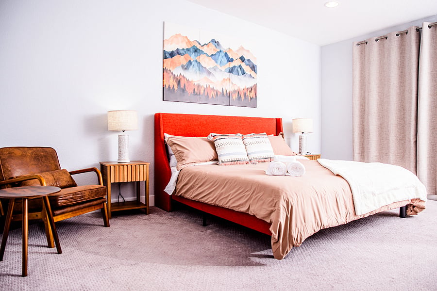 Wake up refreshed in your king bed, steps to your en suite bathroom with shower bench and walk-in closet. (travel crib, bassinet, changing table, portable safe if needed)
