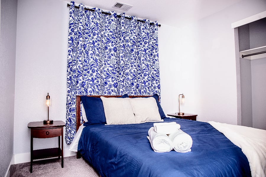 Queen bedroom with plenty of sunlight, privacy, and closet. Walk a few steps to the full bathroom with bathtub.