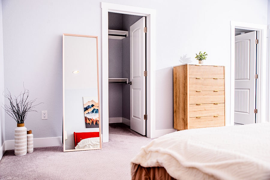 Master King bedroom with walk in closet, en suite full bathroom with shower, full length mirror with plenty of sunlight and space to unwind.