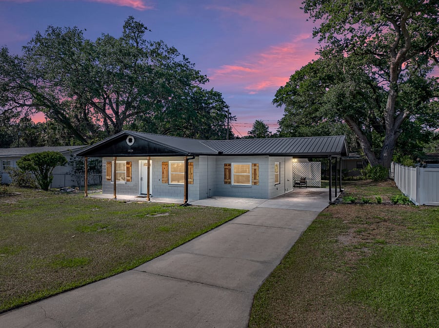 A covered carport and a long driveway, providing plenty of space for parking. Whether you have a larger or longer vehicle, or youre traveling with more than one car, theres room to park comfortably and conveniently right at the home.