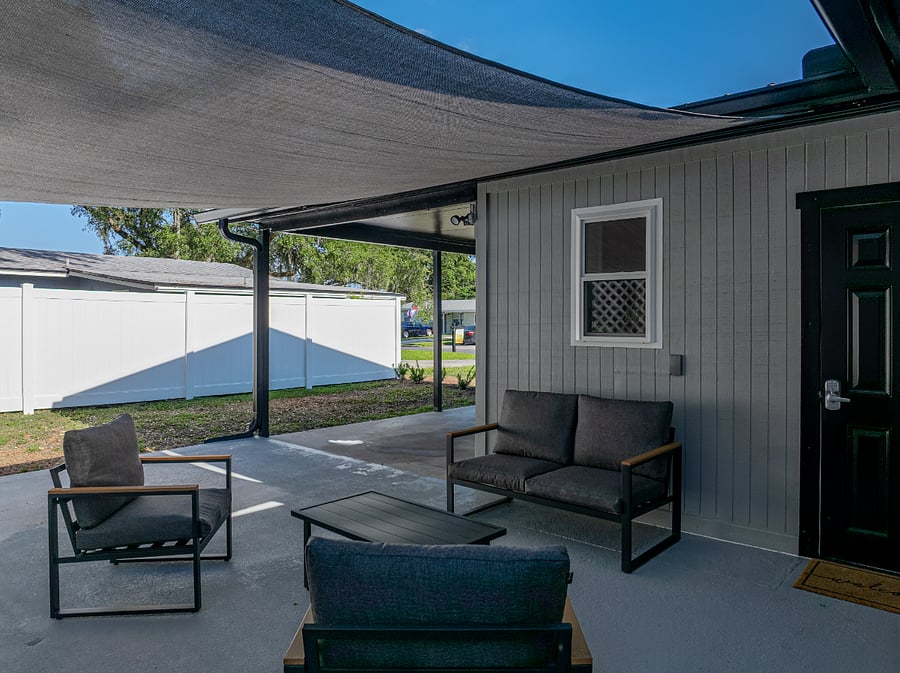 Step outside to your own private, shaded patio with seating and a grill everything you need for a relaxing meal outdoors. Grill utensils are conveniently provided inside the home.