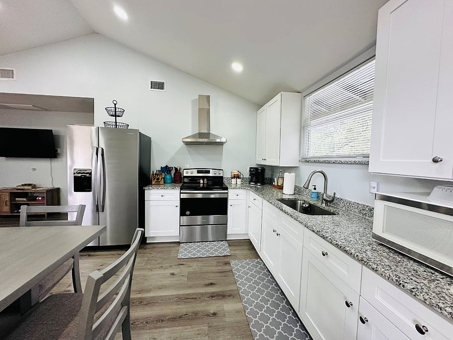 Sleek and stylish, this modern kitchen with stainless steel appliances is perfect for culinary adventures and everyday convenience.