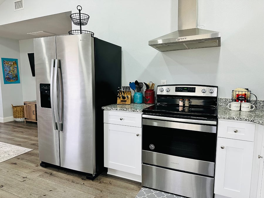 Sleek and stylish, this modern kitchen with stainless steel appliances is perfect for culinary adventures and everyday convenience.