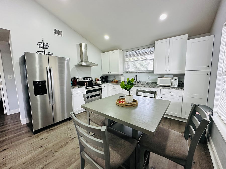 Sleek and stylish, this modern kitchen with stainless steel appliances is perfect for culinary adventures and everyday convenience.