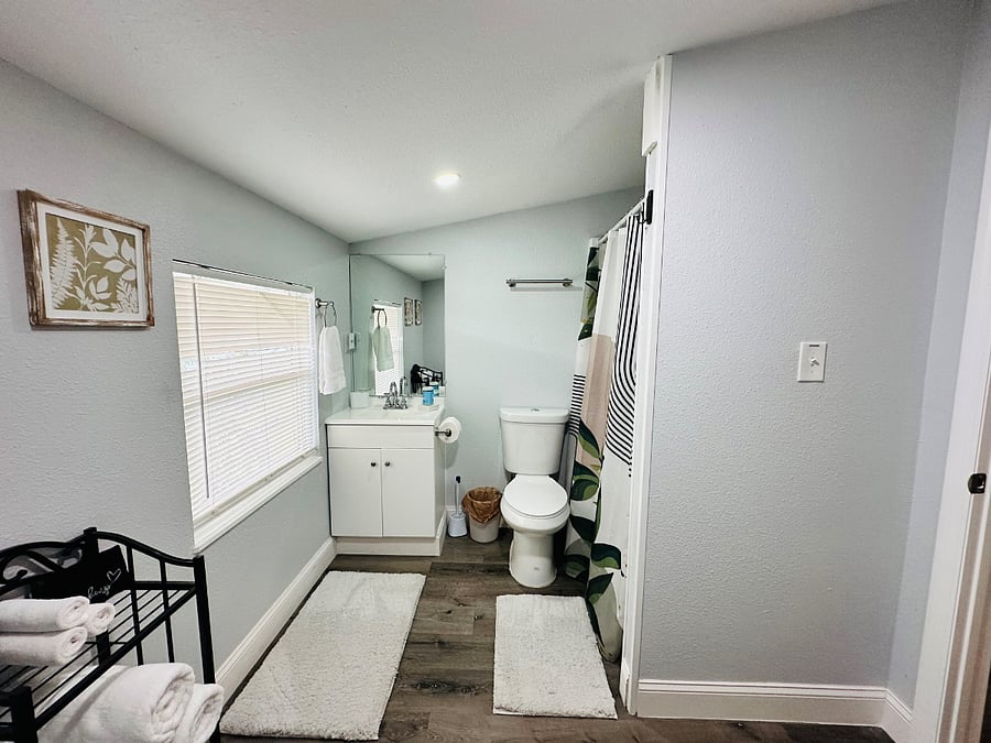 Unwind in our cozy master bathroom with a sleek walk-in showerperfect for a refreshing start or end to your day!