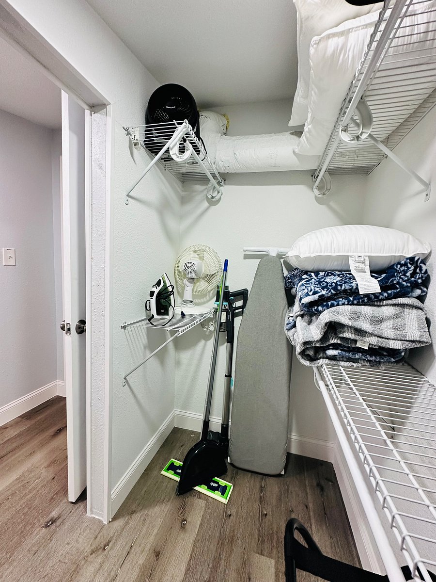 Our master walk-in closet is here to make your stay stress-free! Youll find beach towels for fun days, extra bath towels, cozy pillows, soft sheets, warm blankets, an ironing board, & fans-all thoughtfully provided for your comfort and convenience!