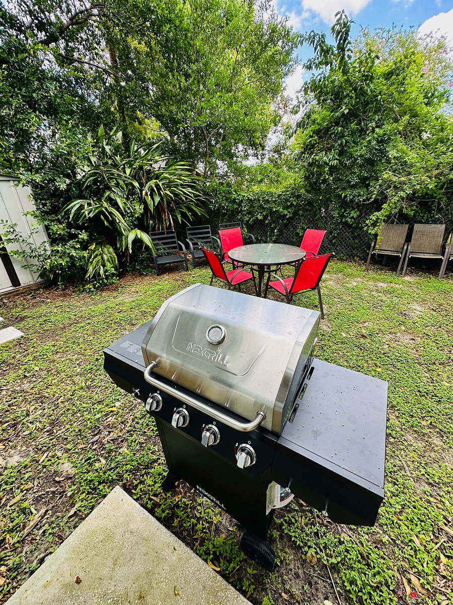 Enjoy Floridas sunshine with outdoor dining, a grill, and seating  perfect for relaxing (when its not raining!).