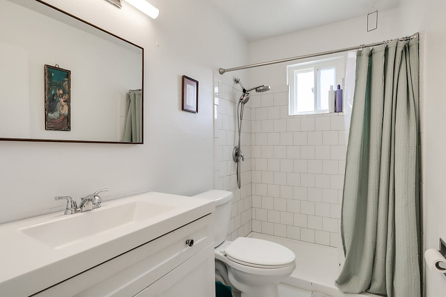 Walk-in shower with updated showerhead
