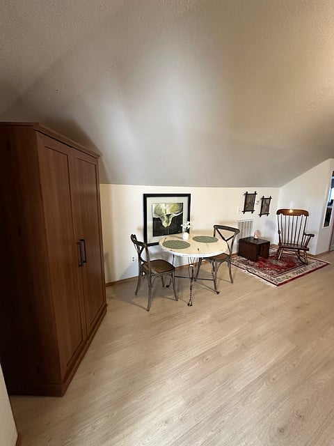 Left of the entry is pantry eating area.
