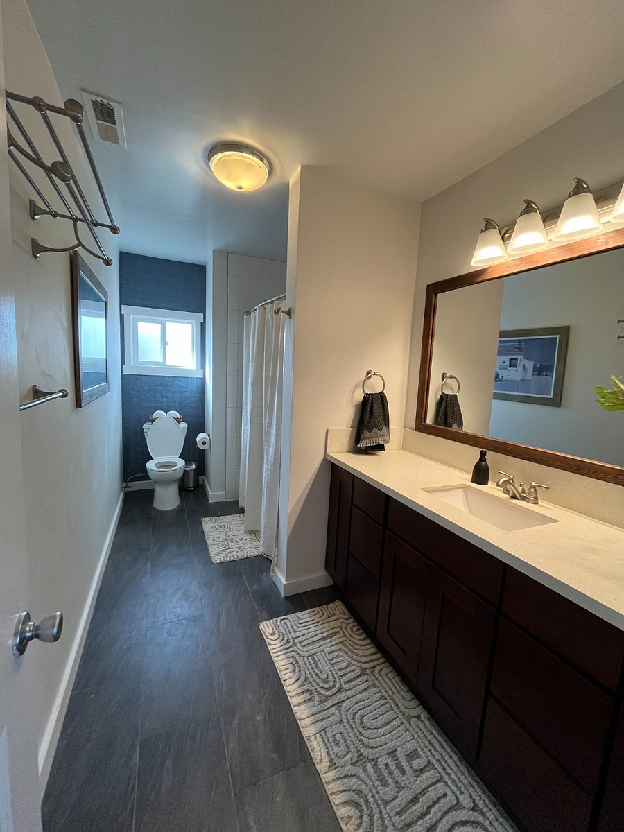 bathroom with tub + shower combination