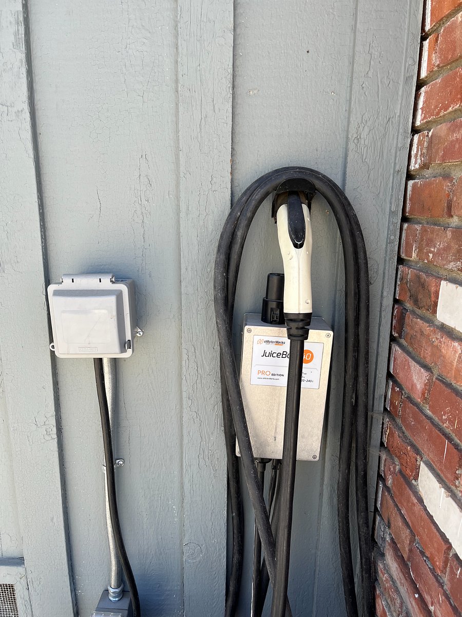 level 2 EV charger with Tesla attachment
