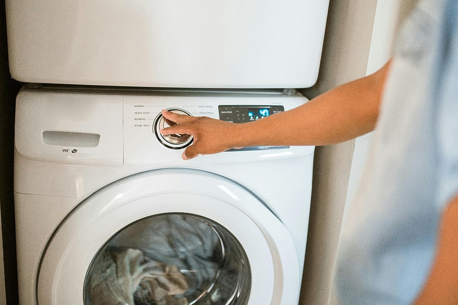 Stackable washer and dryer in unit