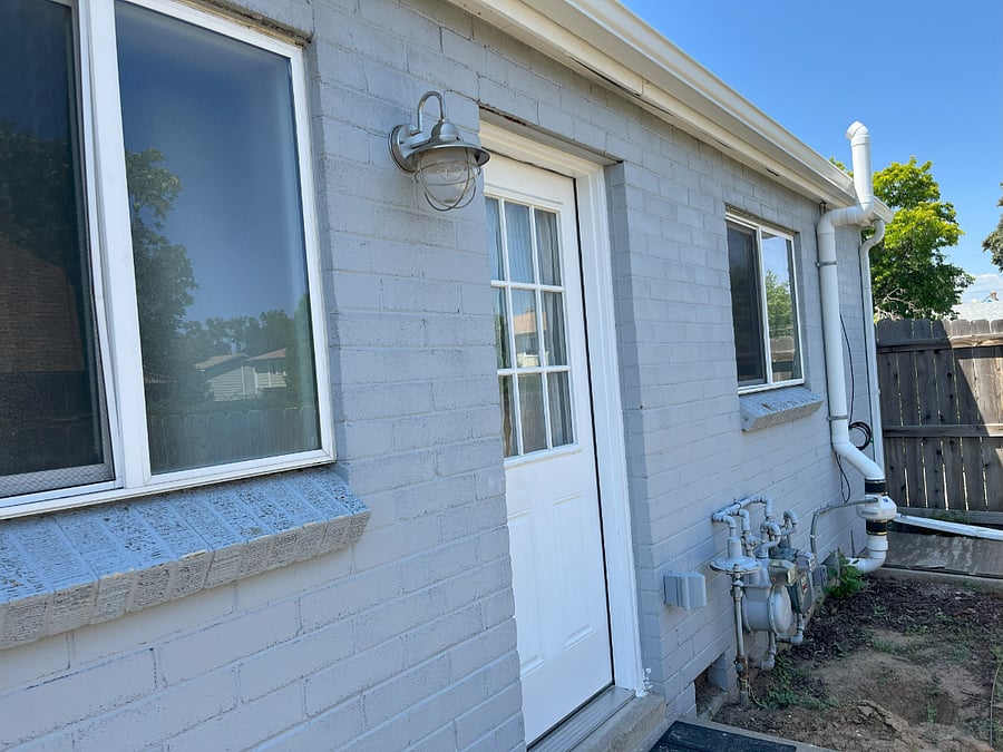 Back entrance into fully fenced backyard.